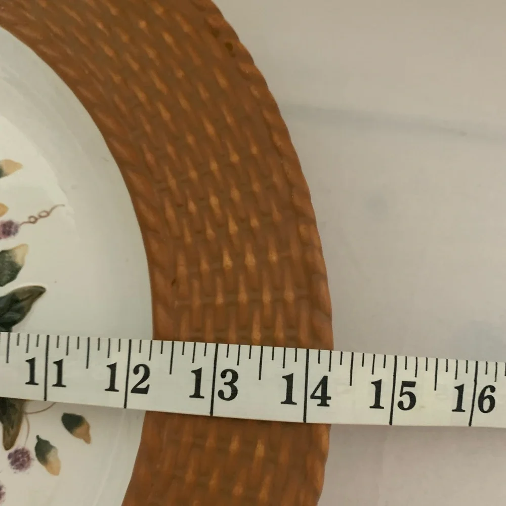 Judy Buswell Harvest fruit basket weave serving dish or pie plate.